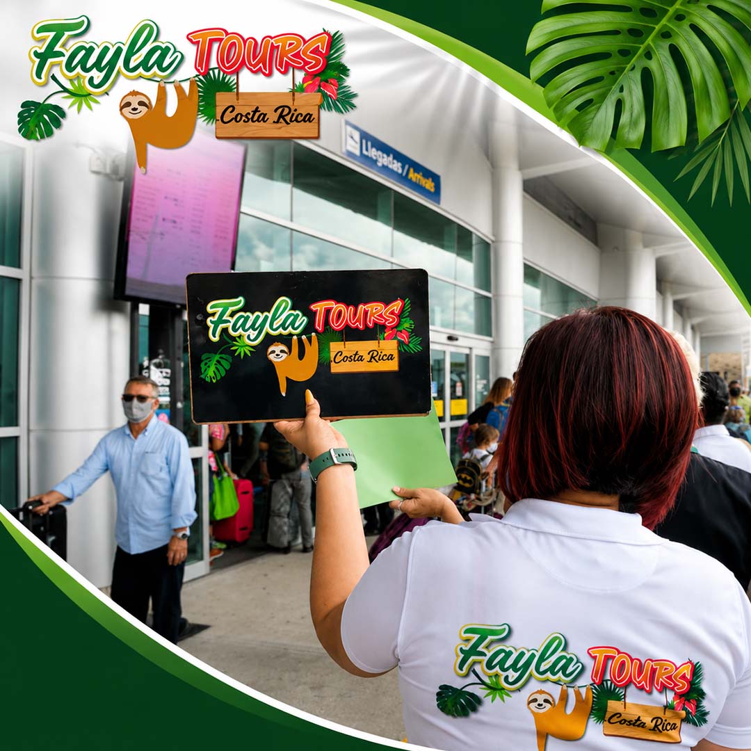 A tour representative with red hair holding up a Fayla Tours Costa Rica sign outside an airport arrivals terminal for incoming passengers.